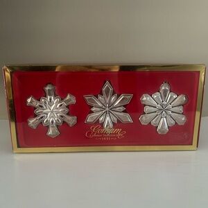 Gorham set of 3 silver plate snowflake ornaments new in box.